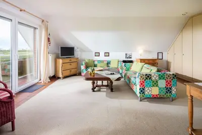 Image de The vacation apartment \"Hölscher 2\" is located \"Am Fischerhafen\" on the upper and top floor