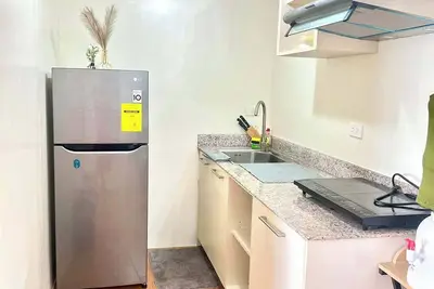 Image de Cozy 3-bedroom condo with WiFi, Ac in Seawind Condominium Sasa Davao City