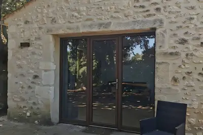 Image de Gîte 'Gite De La Colline - 3 Pers' avec piscine partagée, Wi-Fi et climatisation