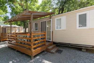 Image de Mobil-home 'Mobil-home D - 1-4 Pers' avec piscine partagée et jardin commun