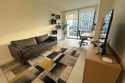 Image de Always 5 stars apartment in Downtown Doral with fitness room, pool and fast WiFi