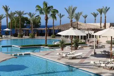 Image de Cliffside Family Resort | 4 Relaxing Rooms, Beach, Pools & All-Day Fun