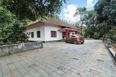 Image de 4-bedroom farmhouse in peaceful Periya with WiFi