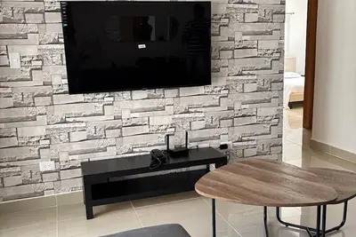 Image de Charming 3-bedroom apartment with Wi-Fi, Ac in welcoming Santo Domingo Este.