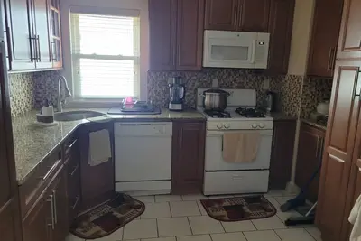 Image de 3-bedroom apartment in fabulous Queens with WiFi Ac, near to park and beach.