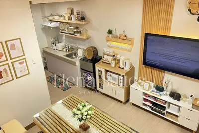 Image de Séjour confortable et esthétique avec Ps4, Netflix et coin café