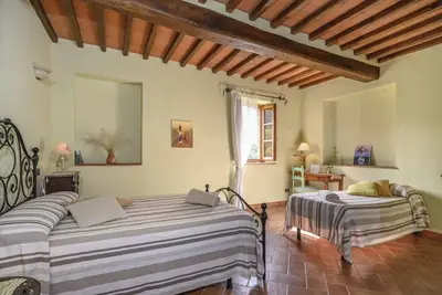 Image de Appartement 'Granaio' avec piscine partagée, jardin privé et Wi-Fi