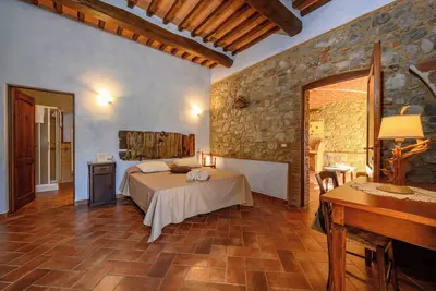 Image de Appartement 'Il Trinciatoio' avec piscine partagée, jardin privé et Wi-Fi