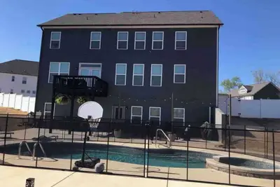 Image de Spacious 7bedroom house in McDonough with Pool, WiFi, fitness room, and theater