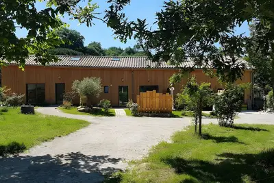 Image de Gîte Tulipier - La Grange aux Arbres