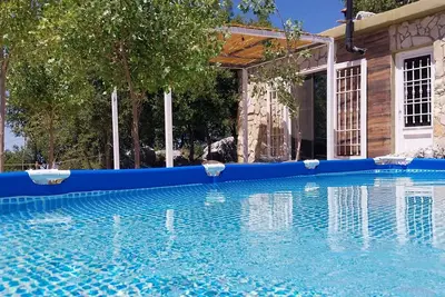 Image de Cozy bungalow integrated in the rocks between the oaks in charming Aannaya