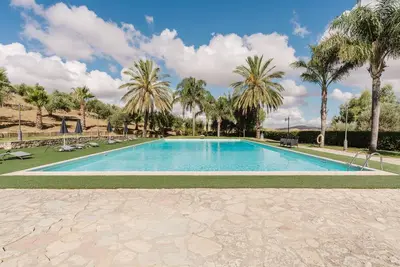 Image de Agriturismo Ponte Calatrasi Chambre 'Quadruple 1' avec piscine partagée, Wi-Fi et climatisation