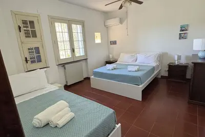 Image de House by the Sea, nestled in a natural oasis.