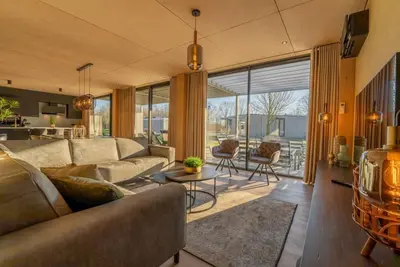 Image de Generous luxury villa with 4 bedrooms 3 bathrooms and spacious terrace. Enjoy nature and comfort with the whole family in North Limburg.