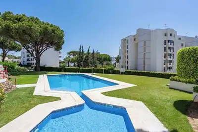 Image de Sunny Escape with a Pool & Balcony by HostWise