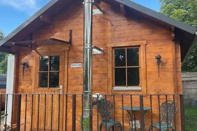 Image de Feriengarten-im-Erzgebirge wooden house in Lugau with playground family vacation Erz