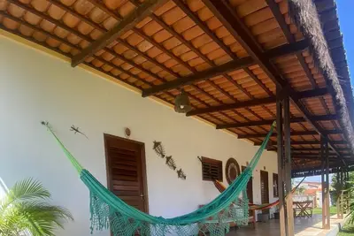 Image de casa localizada em guajiru, casa que oferece tranquilidade e conforto