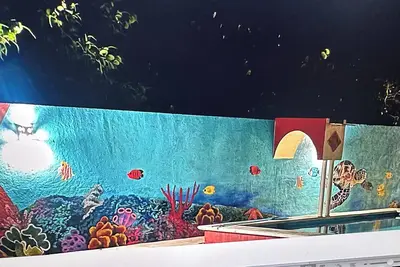 Image de “Serene Courtyard Stay – Follow the Path to the Sea”