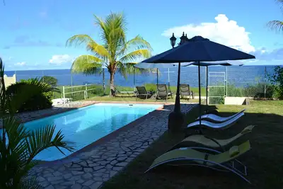 Image de Appartement avec vue imprenable sur la mer et coucher de soleil magnifique.