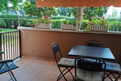 Image de Three-room apartment within walking distance of Punta Grò beach in residence with swimming pool.