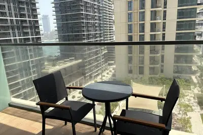 Image de Chic 1-bedroom beachfront apartment with sea, garden and pool view