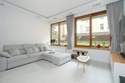 Image de Piekny Apartament z Ogrodkiem i Tarasem & Parking by Noclegi Renters