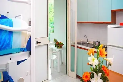 Image de Appartement 'Sabbia D'oro' avec piscine partagée et Wi-Fi