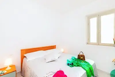 Image de Appartement 'Sabbia D'oro, Trilocale 505' avec piscine commune et Wi-Fi