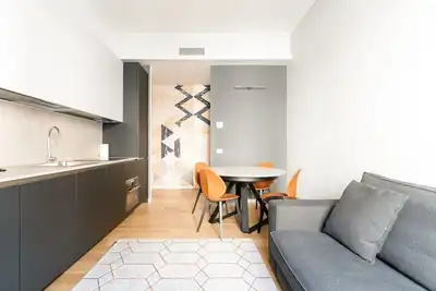 Image de GuestHost - Charming apartment of about 50 square meters, able to accommodate up to 4 people, located on the first floor of a building with a lift (Not suitable for disabled people - there are some steps to access it). The property is located just a few s