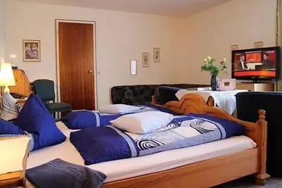 Image de Chambre 'Familienzimmer 4 Pers' avec terrasse partagée, balcon et Wi-Fi