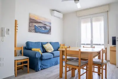 Image de GuestHost - Cozy apartment of about 55 sqm, able to accommodate up to 6 people, located on the third floor of a building with a lift. The property is located in Lido Adriano, a seaside resort on the Adriatic coast and a few kilometers from Ravenna, in a w