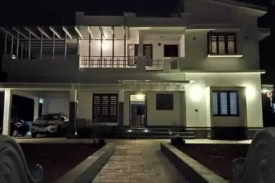 Image de Spacious 4-bedroom house with WiFi, Ac in serene Kannur