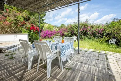 Image de Cozy 125 sqm villa located on the ground floor, perfect for 6 people. The property is located within the Is Molas Resort, in Pula, and offers the possibility of playing golf (for a fee) at the exclusive Golf Club. Guests can also use a shared swimming poo