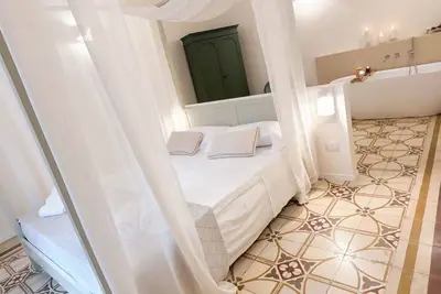 Image de Essenze di Puglia - Holiday Rental - Superior suite apartment with bathtub