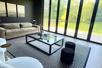 Image de Escape to serenity at our Pondside Modern House