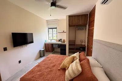 Image de Cozy 2-bedroom apartment in Tulum near the beach- Ac, & Jungle Gym