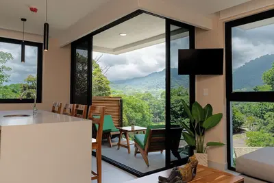 Image de Condo 2Ch Vue Jungle/Montagne · Terrasse Rooftop · Piscine · Gym · Plage · Clim