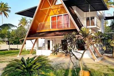 Image de 😁Welcome to Sailor Homes Beach Resort. . .