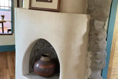 Image de The Cervantes house is a traditional 1800s adobe casa showcasing Nm art