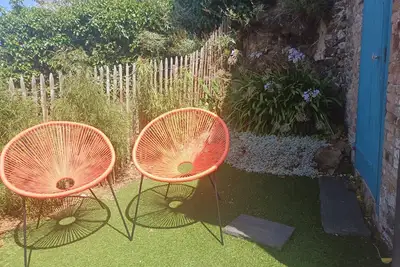 Image de Nouveau! 5 min à pied plages et restaurants. Maison au calme dans rue piétonne