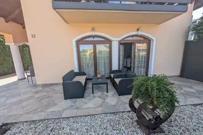 Image de Appartement de vacances avec Wlan et climatisation