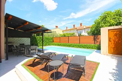 Image de Maison de vacances avec climatisation et piscine