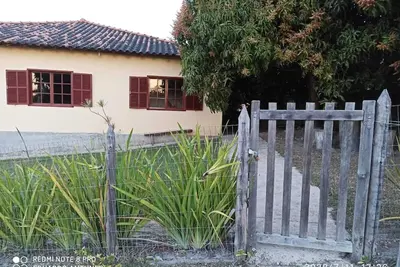 Image de House of the Mango Trees in the main square in São Gonçalo do Rio das Pedras