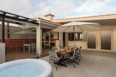 Image de Beach Villa with Jacuzzi & Garage by HostWise
