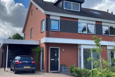 Image de Spacious family house for up to 8 people with garden and playground in front.