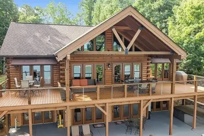 Image de Lakefront Log Cabin - Hot Tub, Pickleball Ct, Fire Pits, 2-Story Dock, Game Room