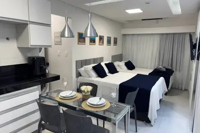 Image de Flat com piscina a 50m da praia