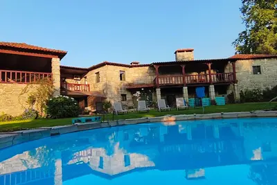 Image de Maison de vacances 'Casa Nova das Oliveiras' avec vue montagne, Wi-Fi et climatisation