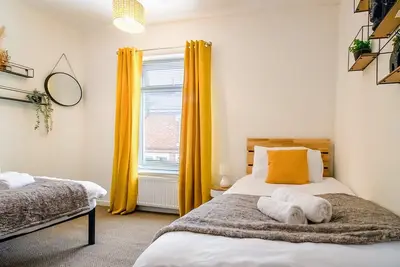 Image de Maison-Standard-Salle de bain privée-Vue sur Jardin