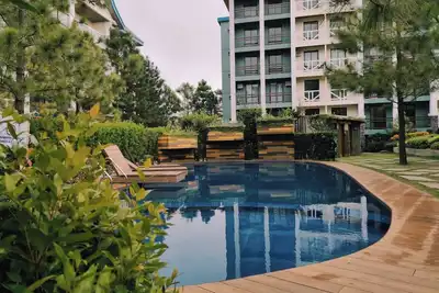 Image de 15 minutes away from Skyranch & Starbucks Hiraya - Amaria Place With Netflix